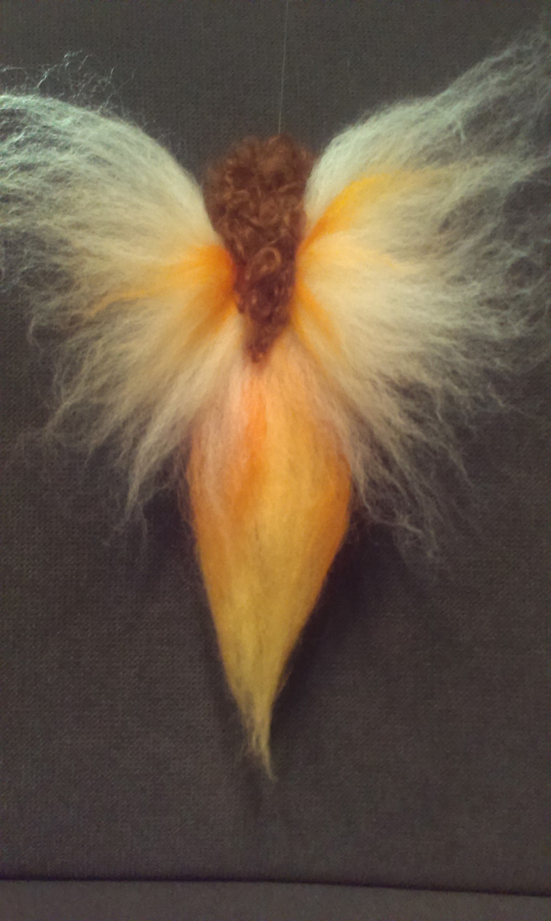 Engel mit braunen Locken Engel mit braunen Locken